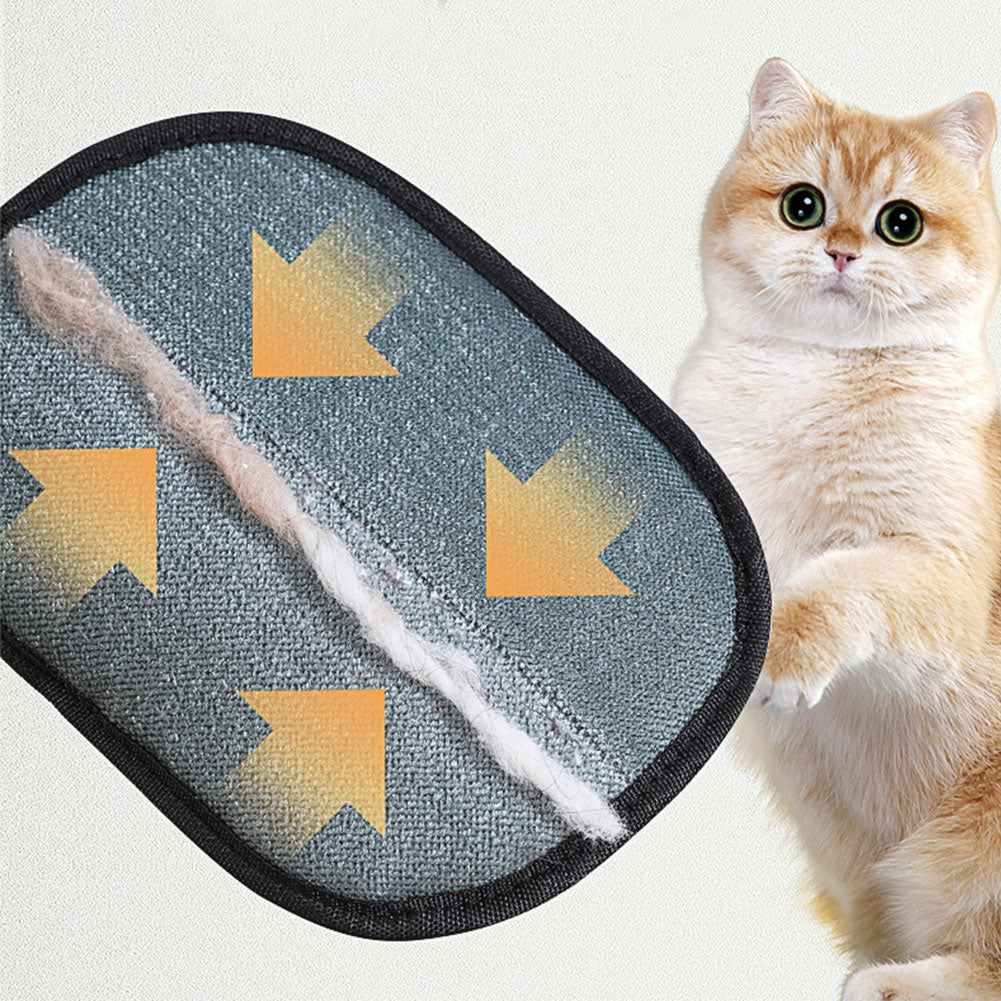 Loose cat fur collected in a line on the mitt