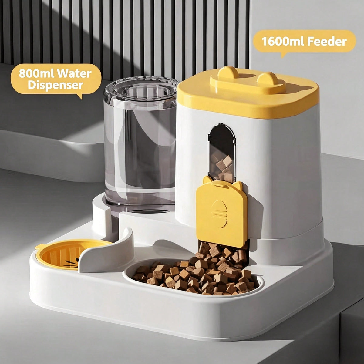 Yellow gravity cat feeder and water station