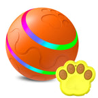 Orange self-rolling cat ball with paw-shaped remote